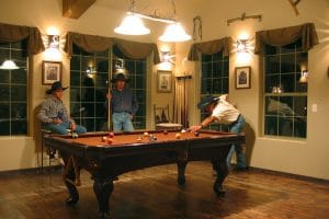 Playing Billiards at Stagecoach Trails Guest Ranch